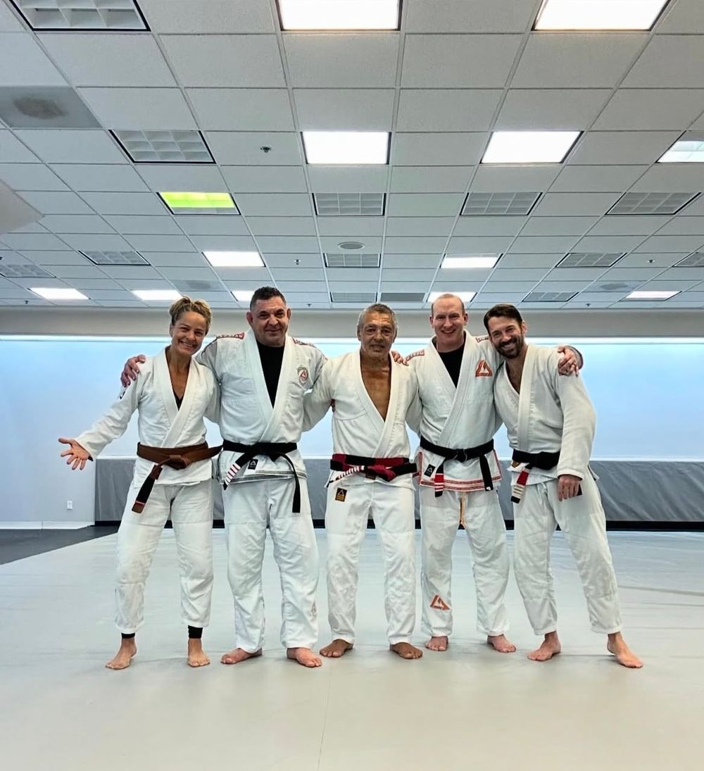 James Driskill with Rickson Gracie and fellow black belts after a seminar